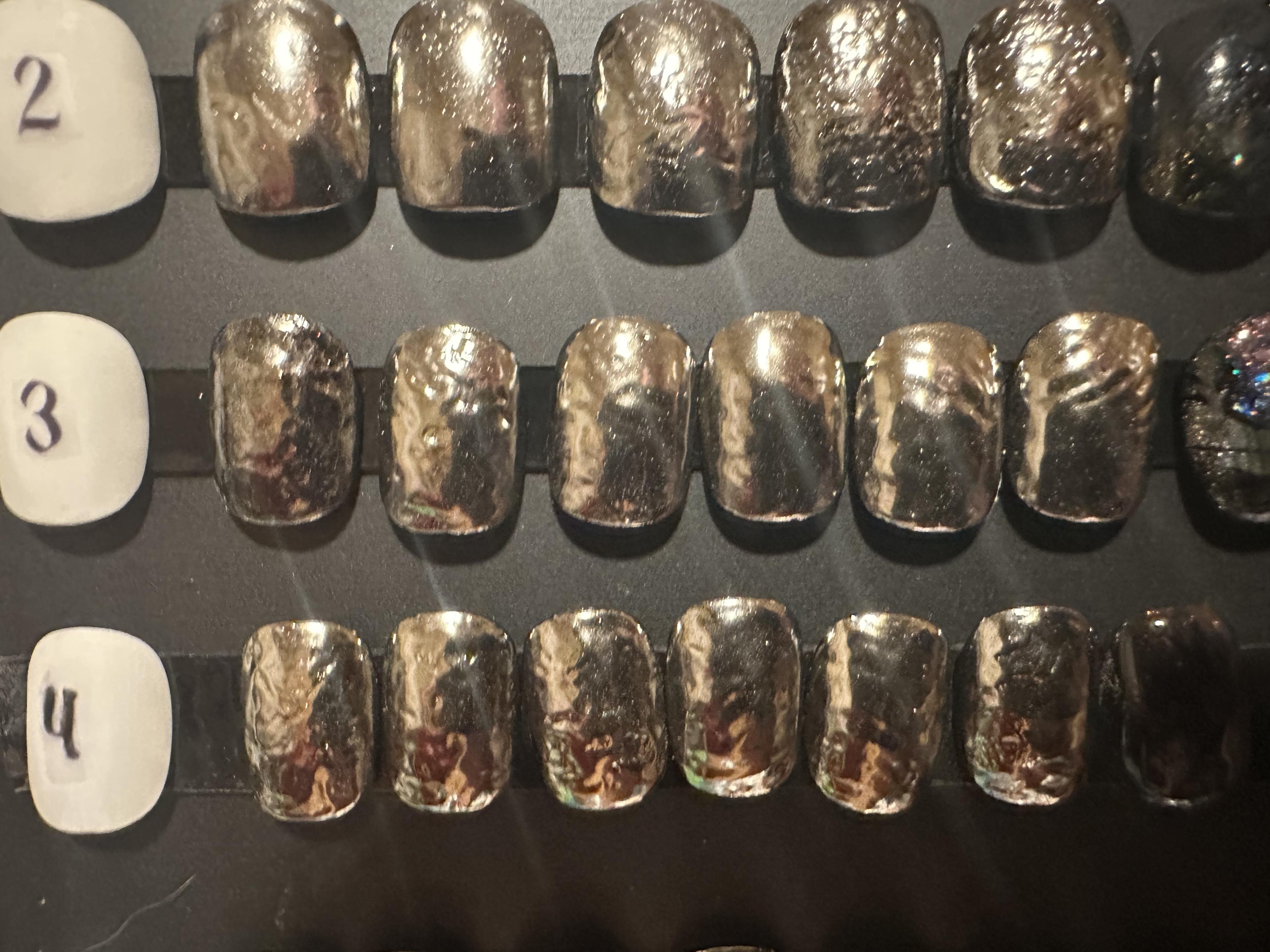 Bronze metallic armor-style nails