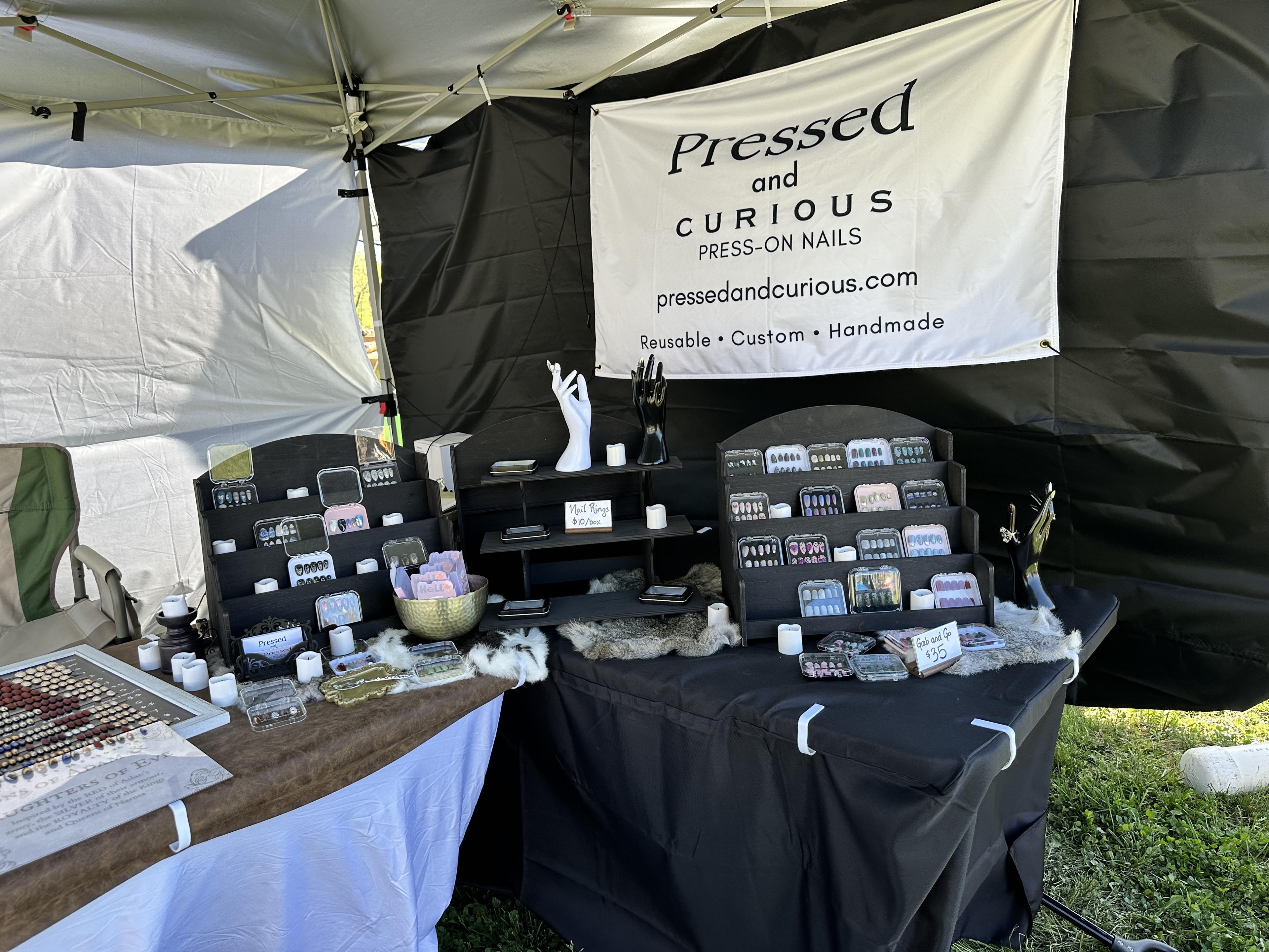 Full booth setup with banner and displays